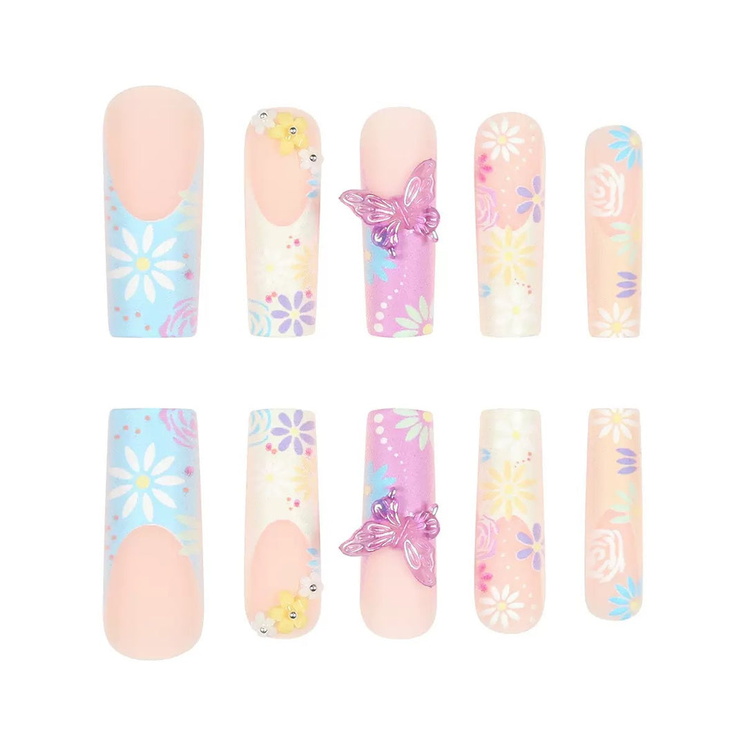 Artificial nails with floral patterns and 3D decorations Stornfield