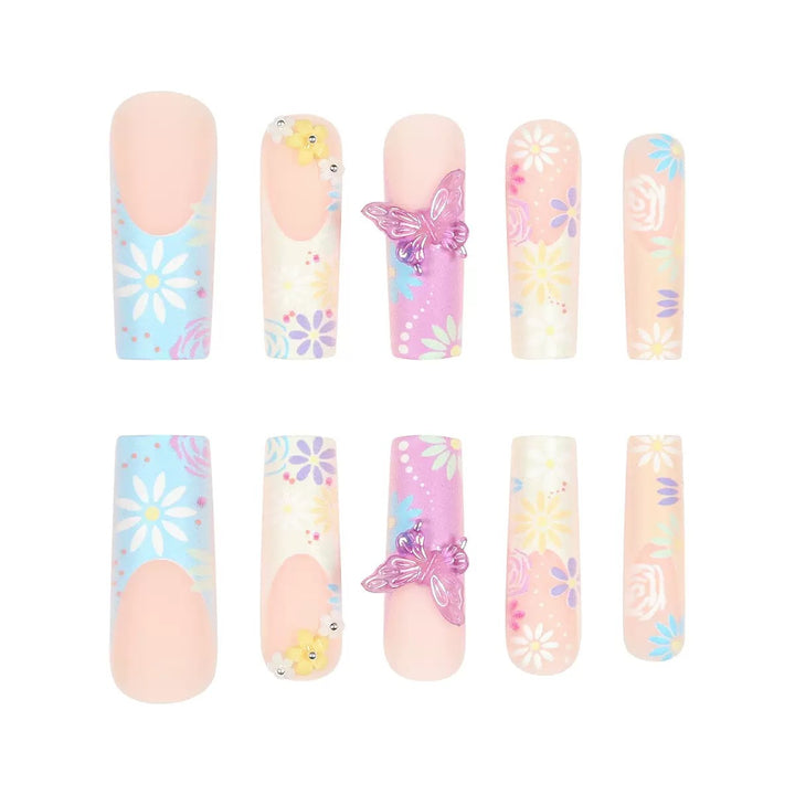 Artificial nails with floral patterns and 3D decorations Stornfield