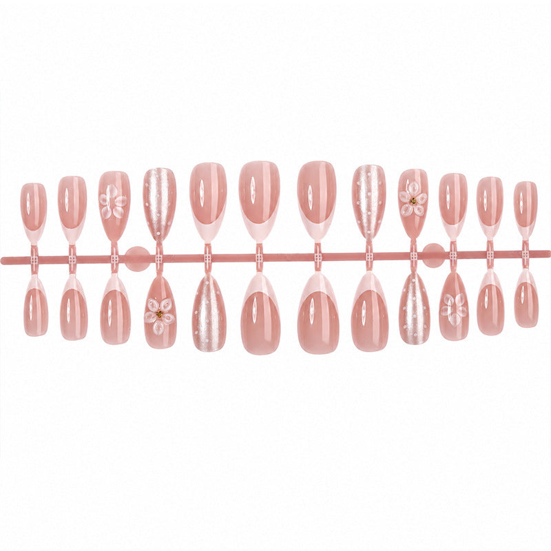 Artificial nail set with elegant flower and glitter designs Stornfield