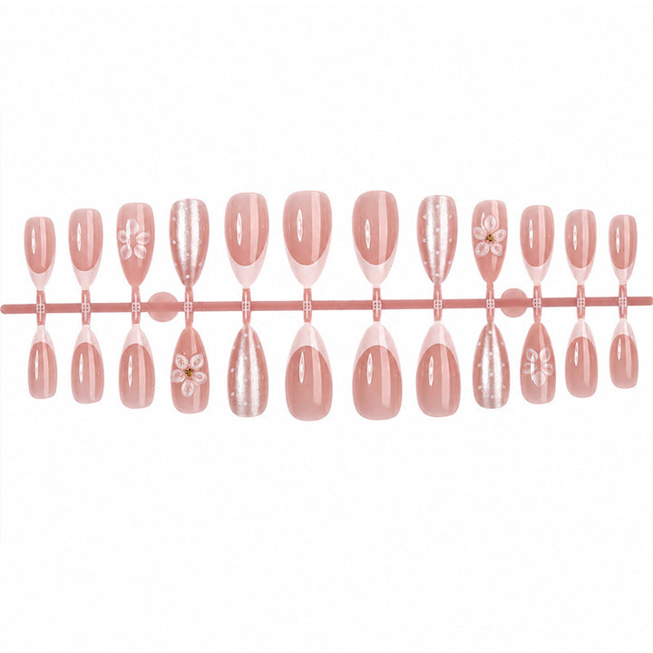 Artificial nail set with elegant flower and glitter designs Stornfield