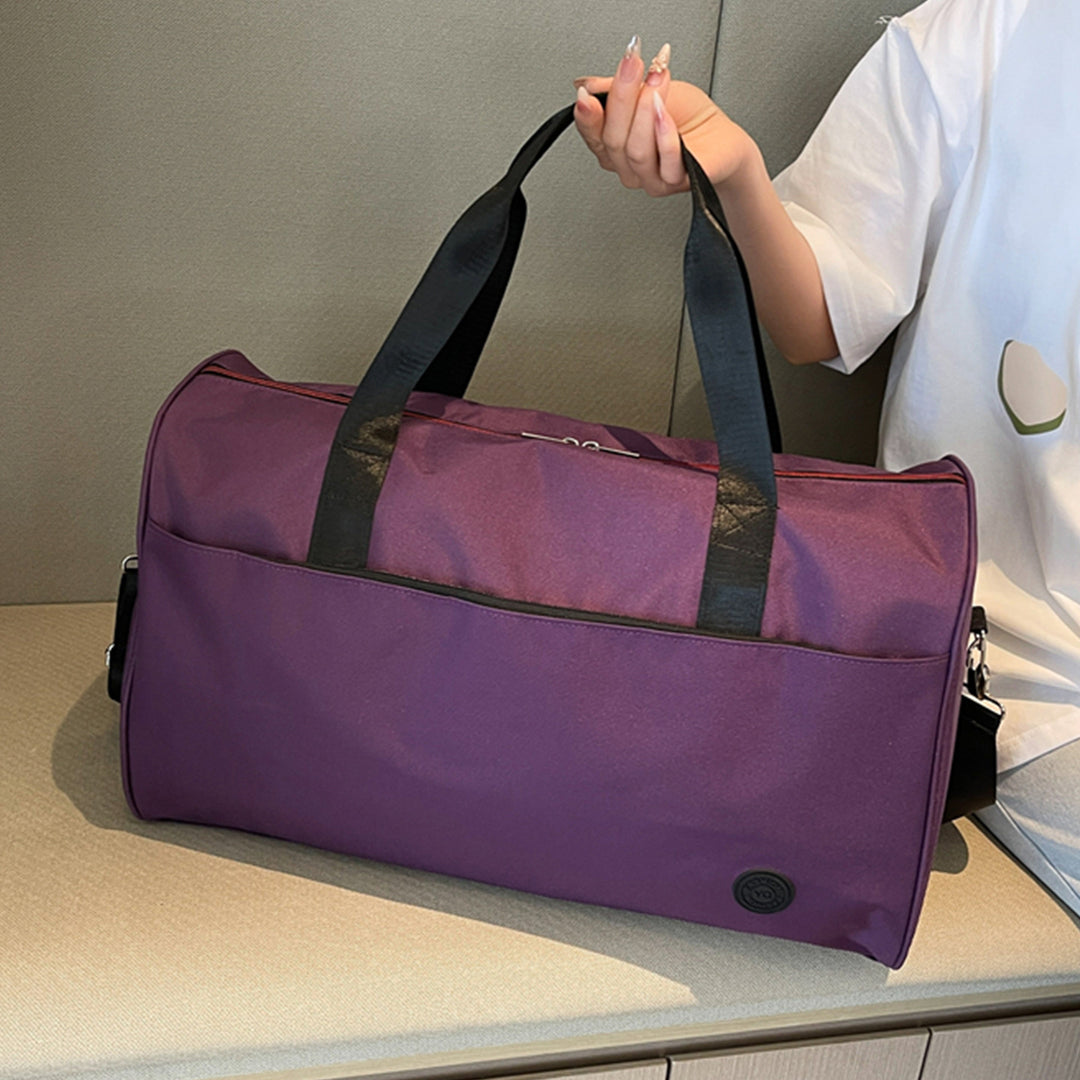 Sporty travel bag with sturdy carrying handles and removable shoulder strap Stornfield