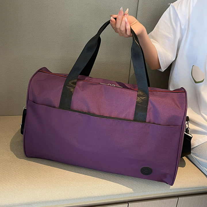 Sporty travel bag with sturdy carrying handles and removable shoulder strap Stornfield