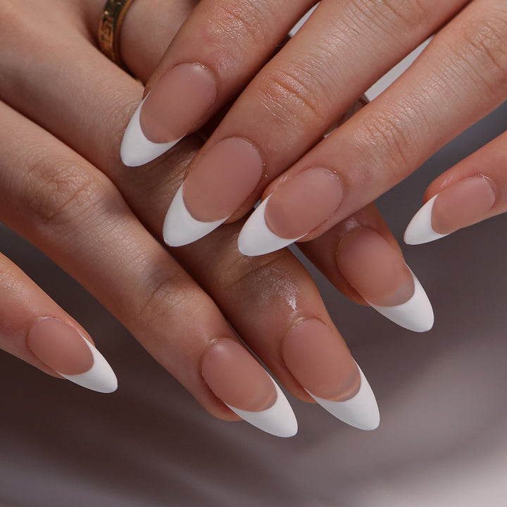 Artistic stiletto nails with elegant French design Stornfield