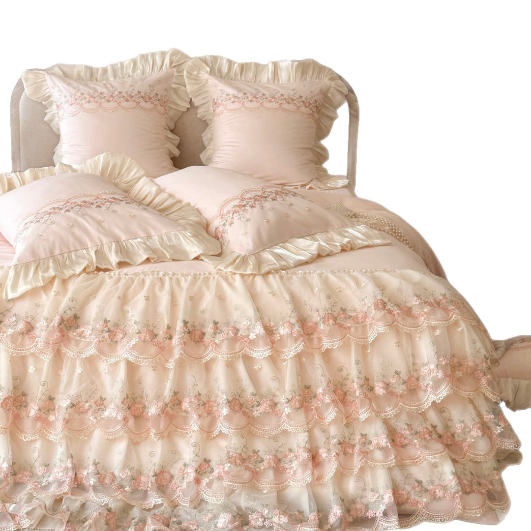 Luxurious Victorian-inspired bedding set with ruffles and embroidery