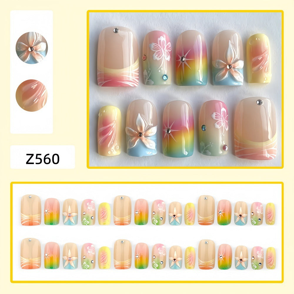 Artful Nail Tips with Floral Accents Stornfield