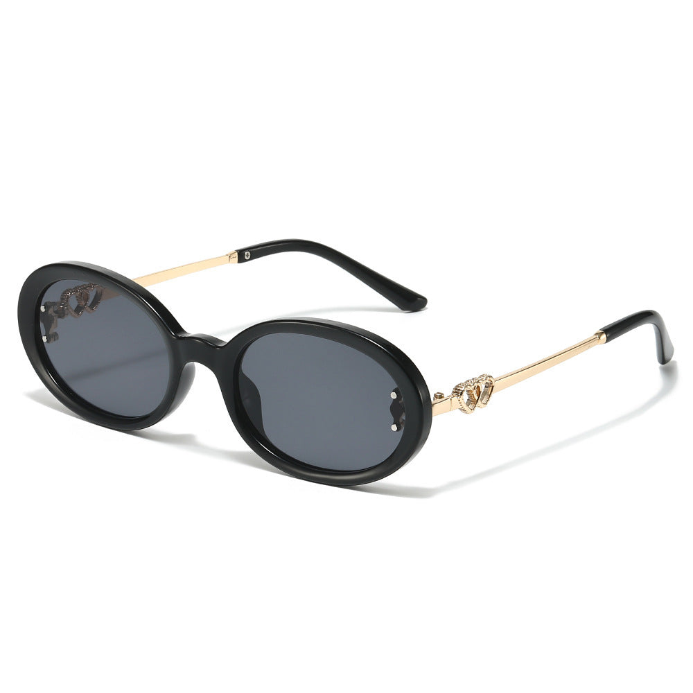 Elegant Shield Sunglasses with Decorative Metal Accents Stornfield
