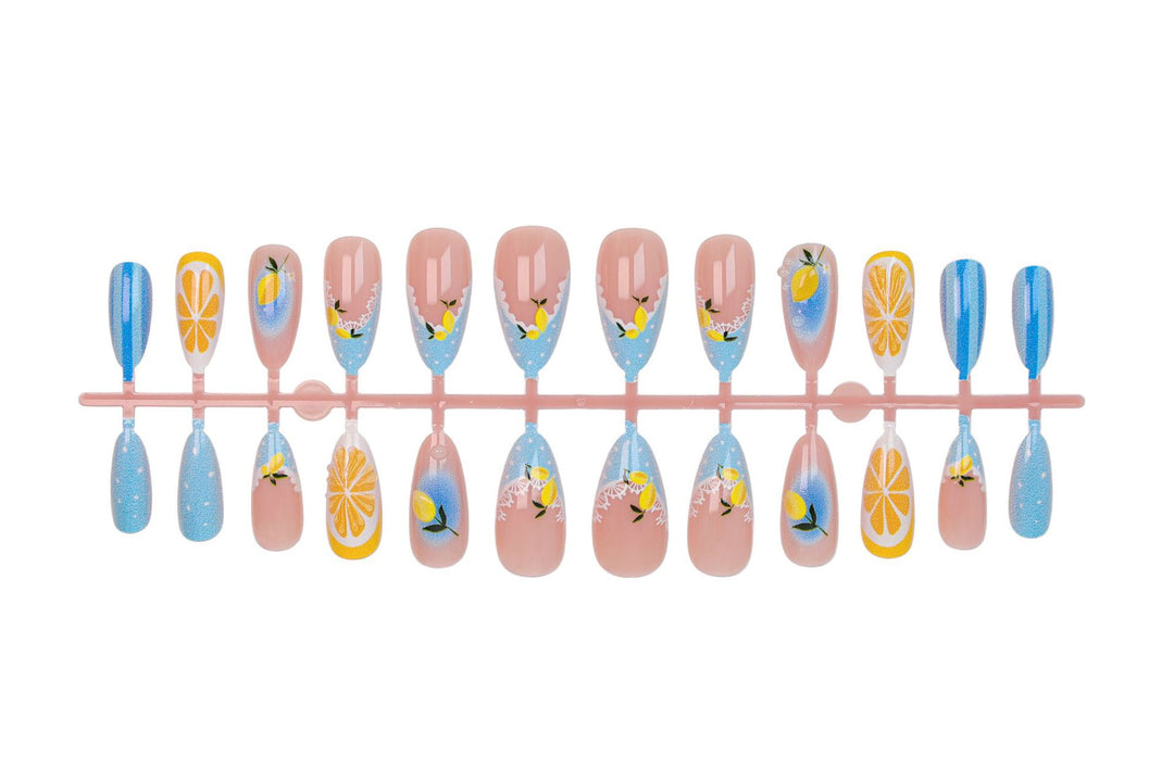 Artificial nail set with cheerful citrus and flower motifs Stornfield