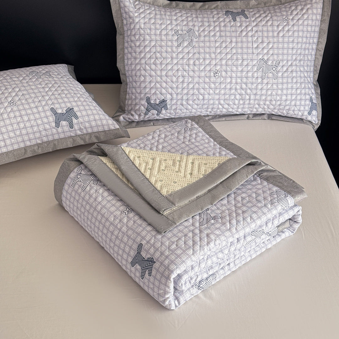 Quilted bedspread and pillow set with geometric striped quilting