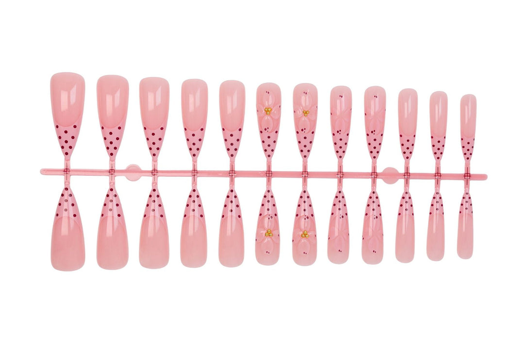 Artificial nail set with romantic flower and polka dot designs Stornfield