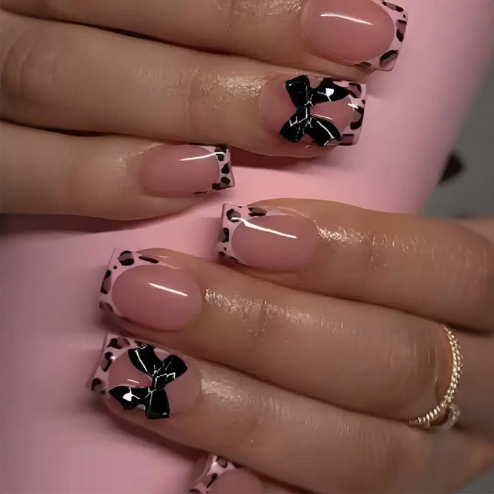 Artificial nail set with delicate bow and leopard patterns Stornfield