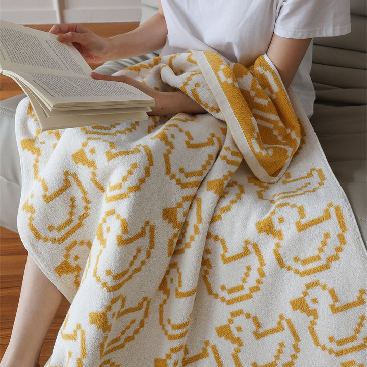 Cuddle blanket with teddy jacquard pattern and extra-soft fleece
