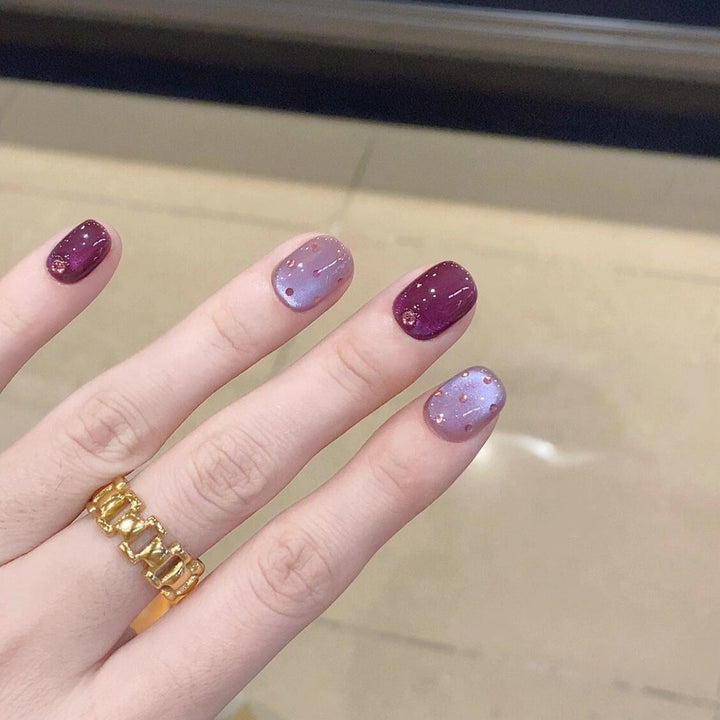 Artificial nails with unique glitter accents Stornfield
