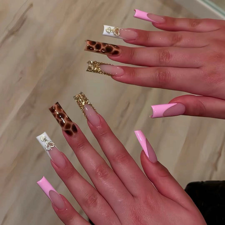 Glamorous Decorative Long Press-On Nails with Metallic Accents Stornfield