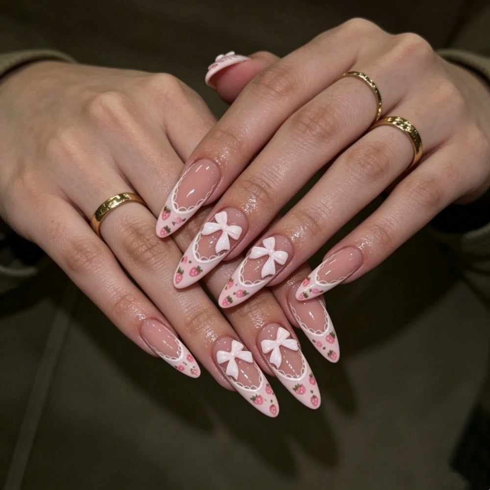 Artificial nails with romantic floral and ribbon motifs Stornfield