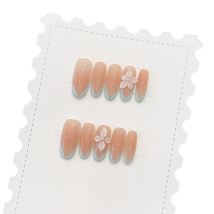 Artificial nails with elegant floral accents Stornfield