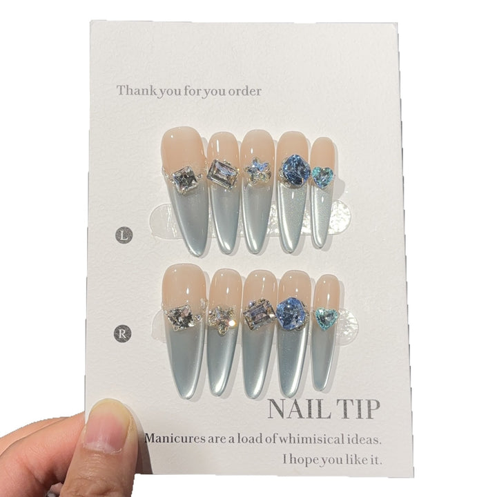 Glamorous artificial nails with sparkling stones Stornfield