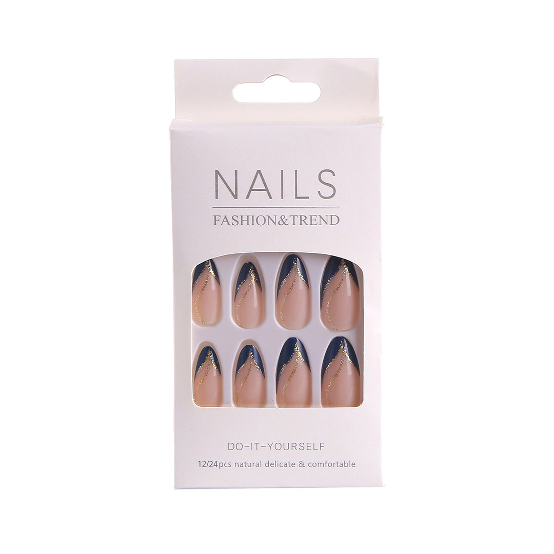 Artistic Nail Design with Elegant Golden Accents Stornfield