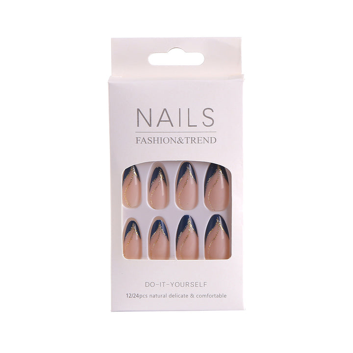 Artistic Nail Design with Elegant Golden Accents Stornfield