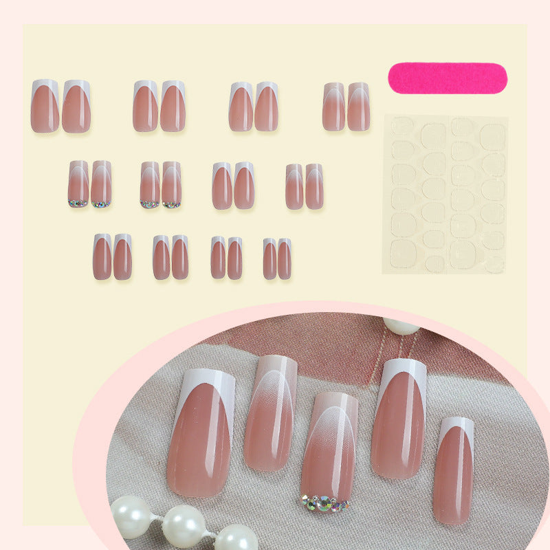 Artificial nail set with elegant ombre accents and seductive rhinestones Stornfield