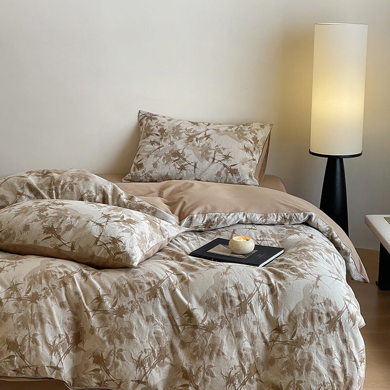 Luxurious cotton bedding set with abstract floral print and reversible function