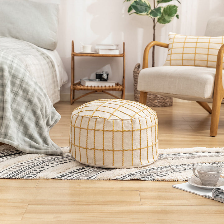 Beef padded seat pouf with embroidered check pattern and cotton cover