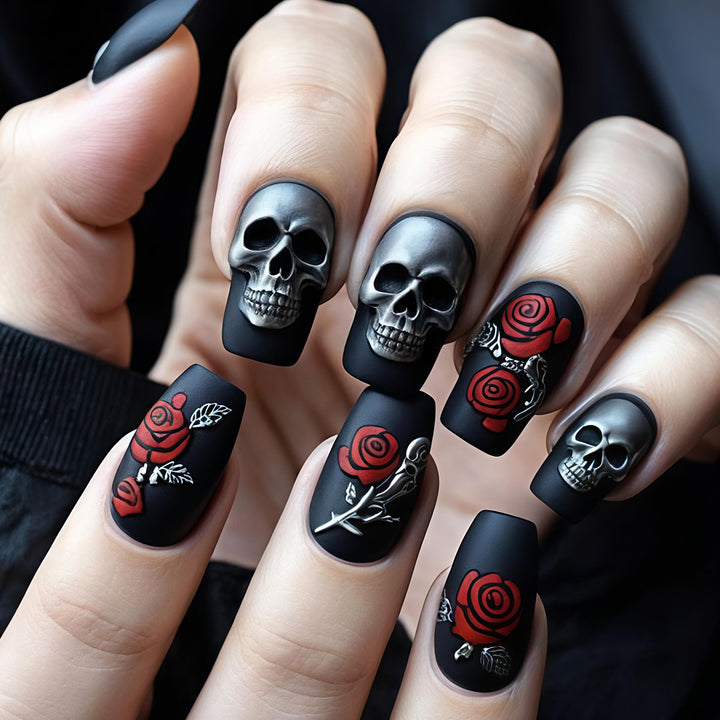 Creative nail art with skull and rose designs Stornfield