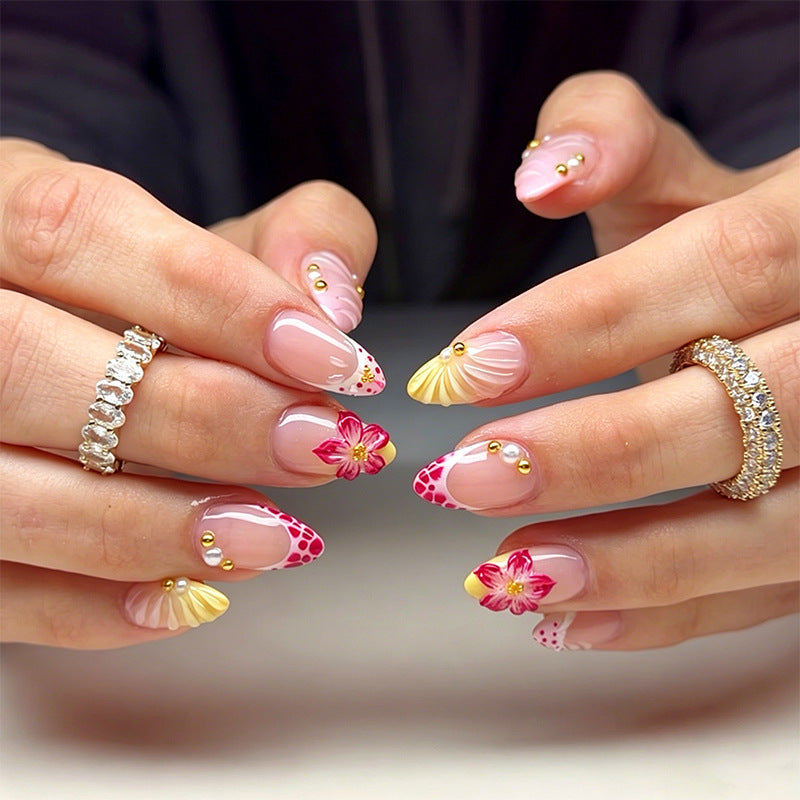 Artificial nail set with floral motifs and elegant embellishments Stornfield
