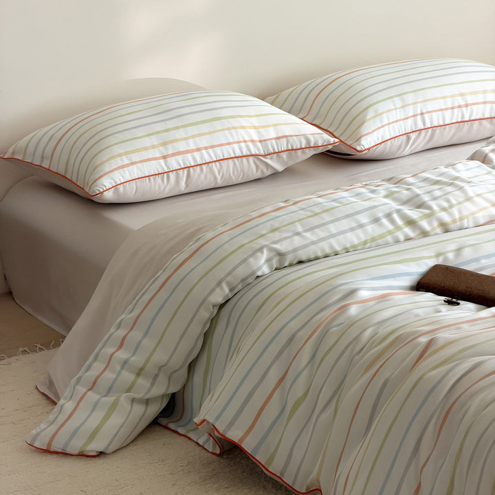 Bedding set made of cotton satin with textured brush print and reversible function