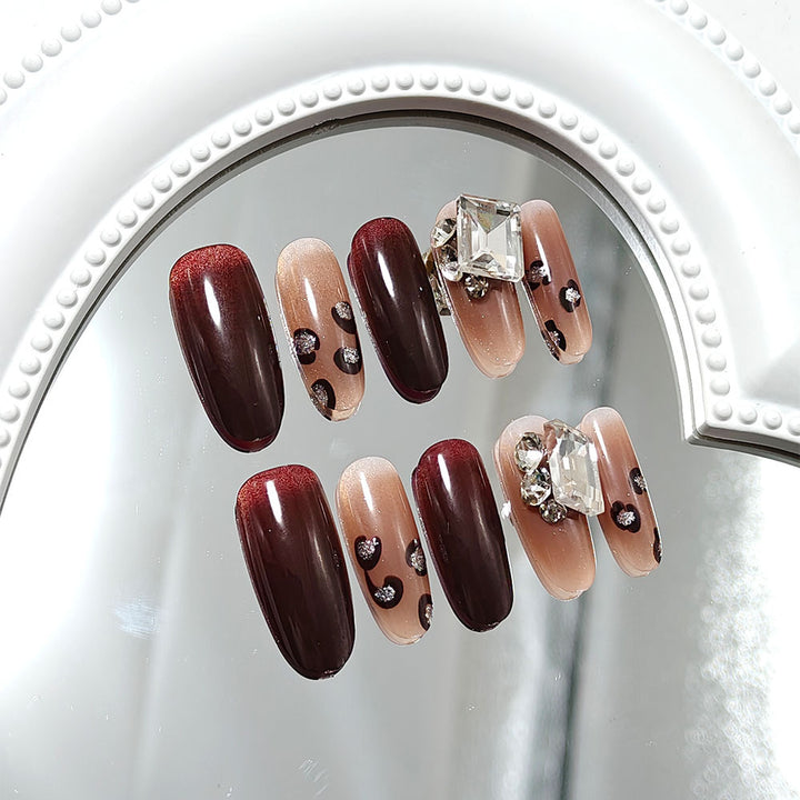 Luxury artificial nails with elegant rhinestone applications Stornfield