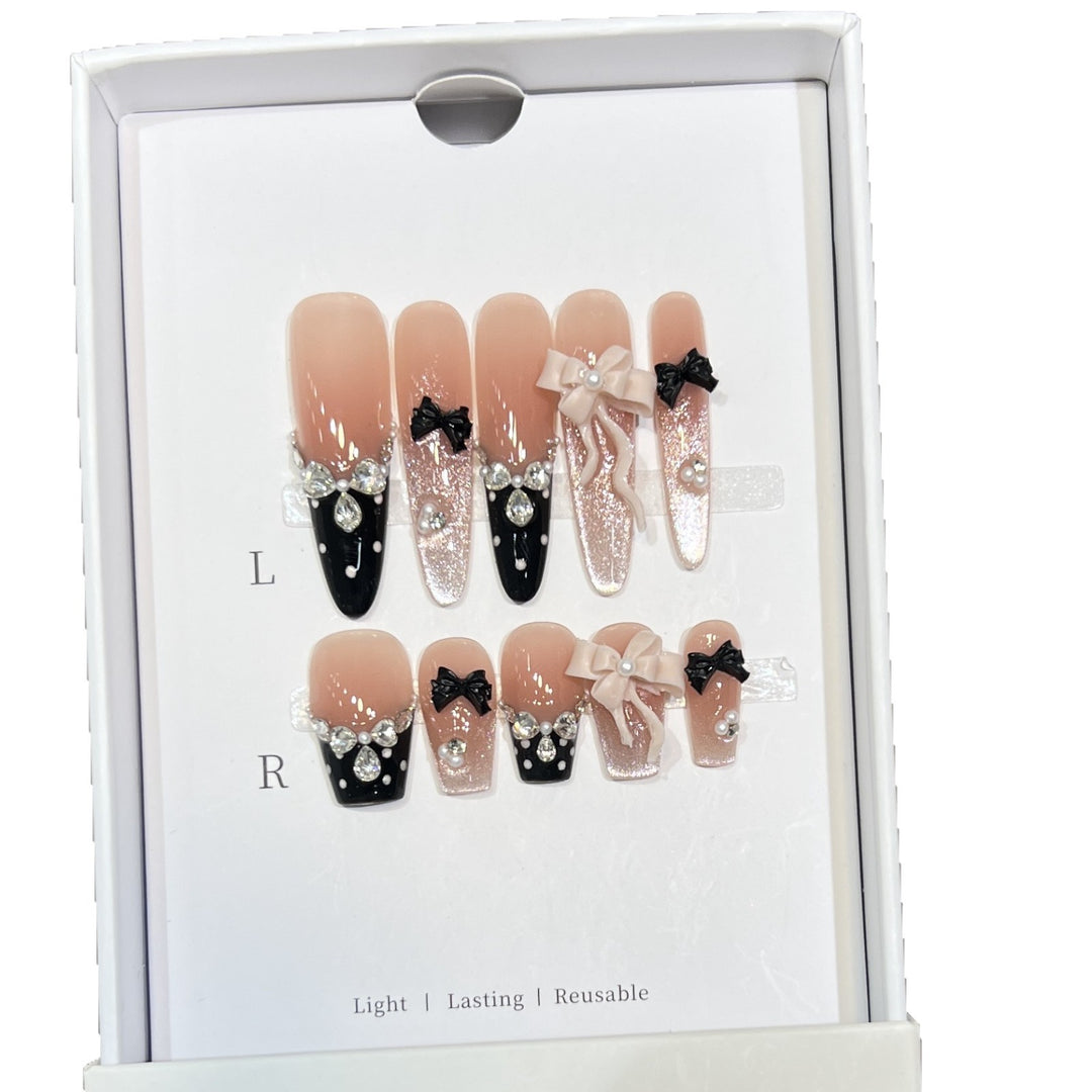 Glamorous Stiletto Press-On Nail Set with Decorative Bow and Gemstone Accents Stornfield