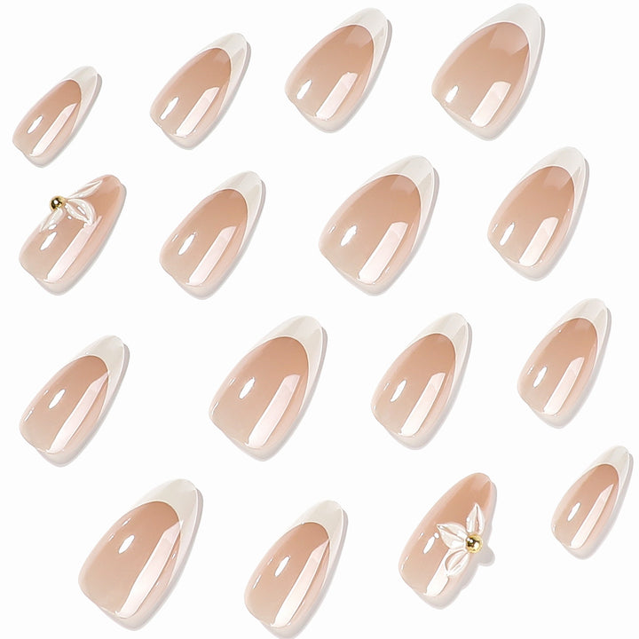 Artful stiletto nails with elegant floral design Stornfield