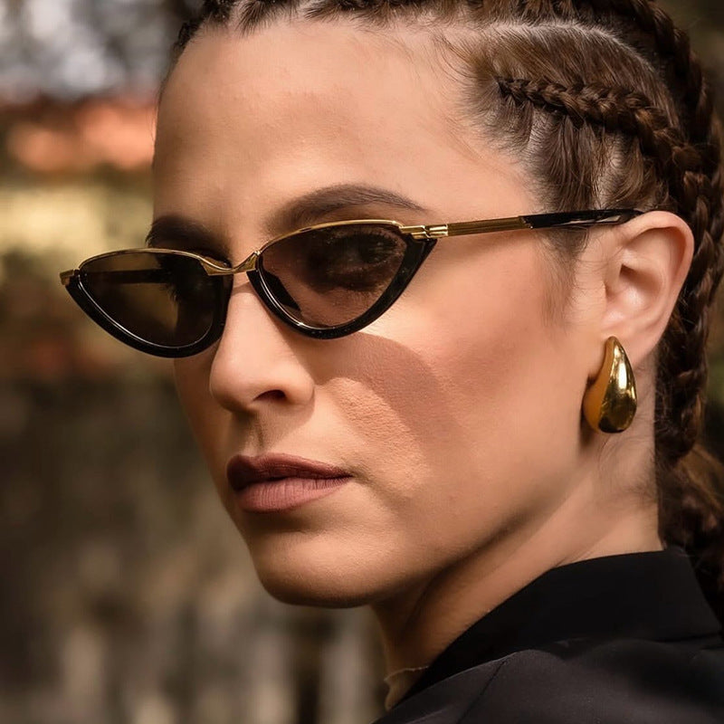Women futuristic Cat-Eye sunglasses with golden accents Stornfield