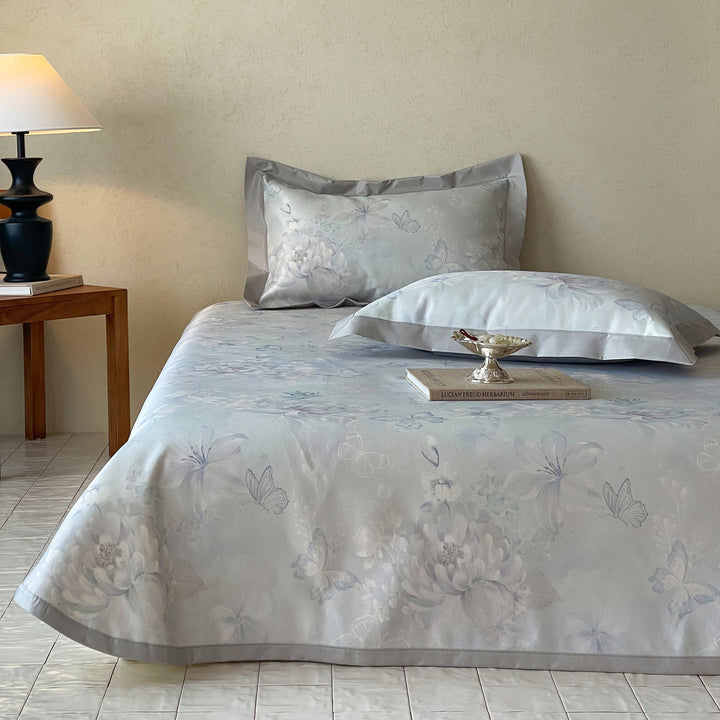 Luxurious satin bed linen set with floral jacquard weaving and wide satin border
