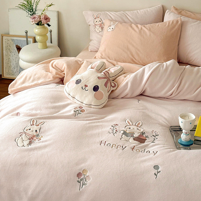 Cute children's bedding set made of soft cotton terry with embroidered cat appliqués and cuddly plush pillow.