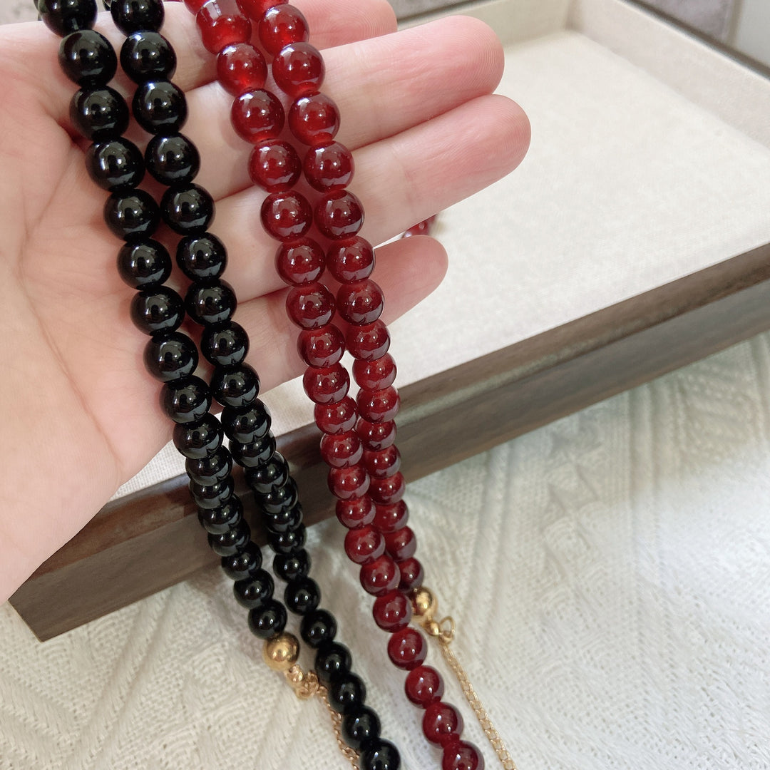 Fashionable jewelry band made of onyx beads Stornfield