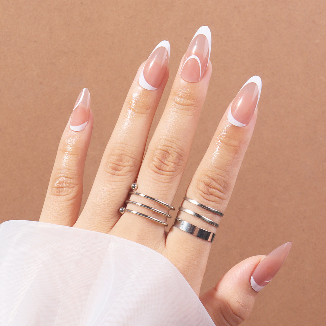 Elegant Stiletto Press-On Nails with Artistic French Tips Stornfield