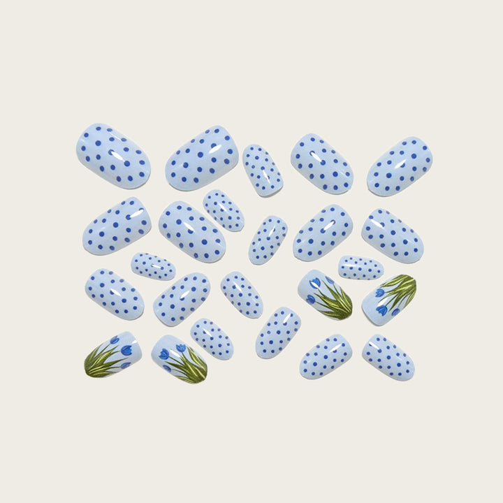 Creative nail art with floral and geometric patterns Stornfield