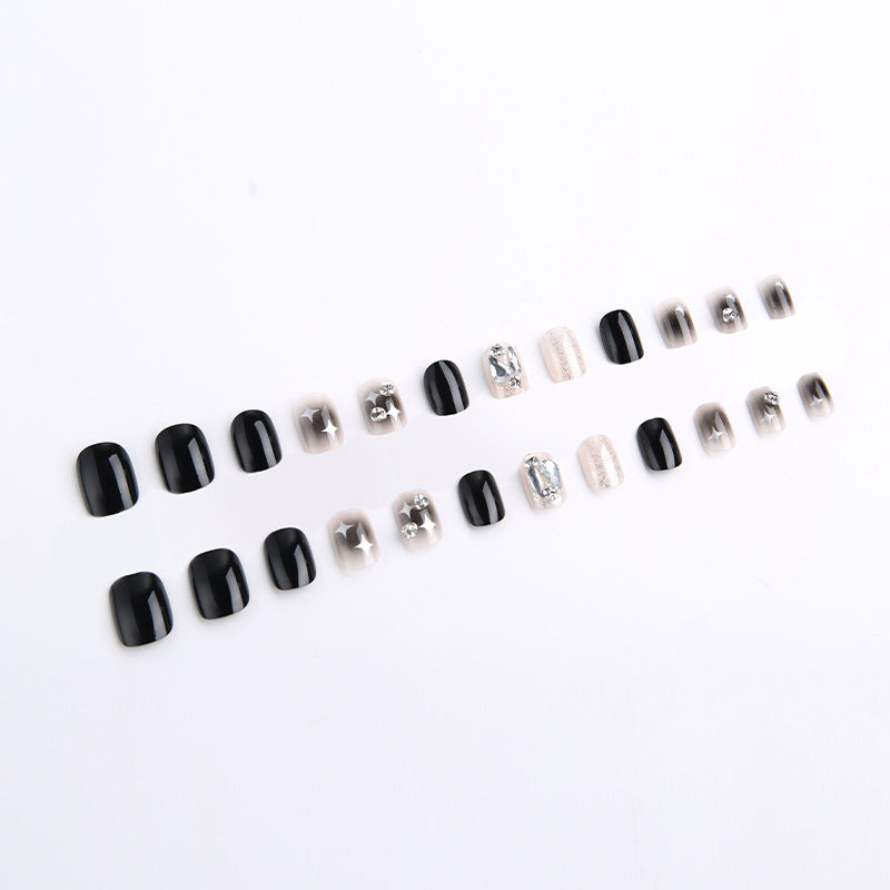 Artificial nail set with glamorous glitter and crystal decorations Stornfield