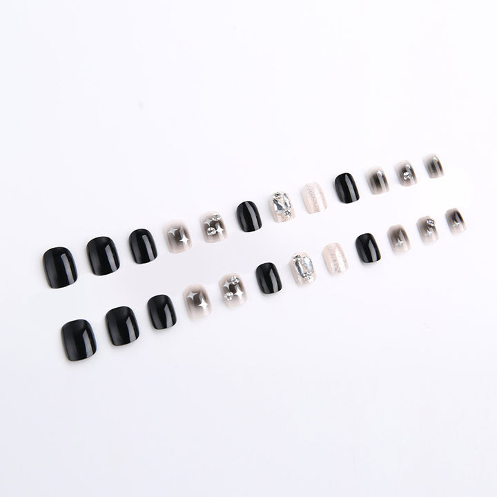 Artificial nail set with glamorous glitter and crystal decorations Stornfield