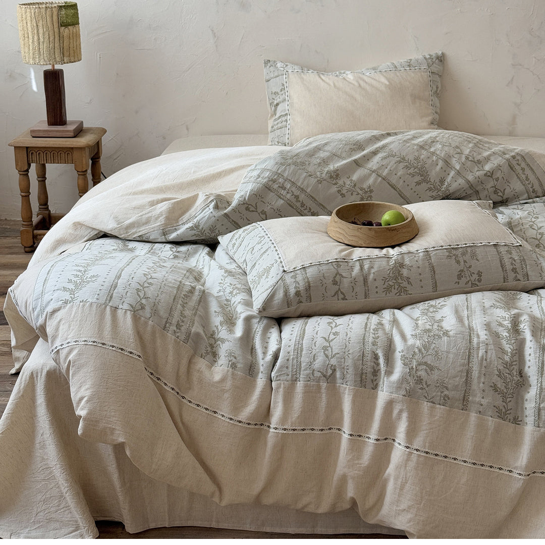Natural linen-cotton bedding set with embroidered border and vintage pattern