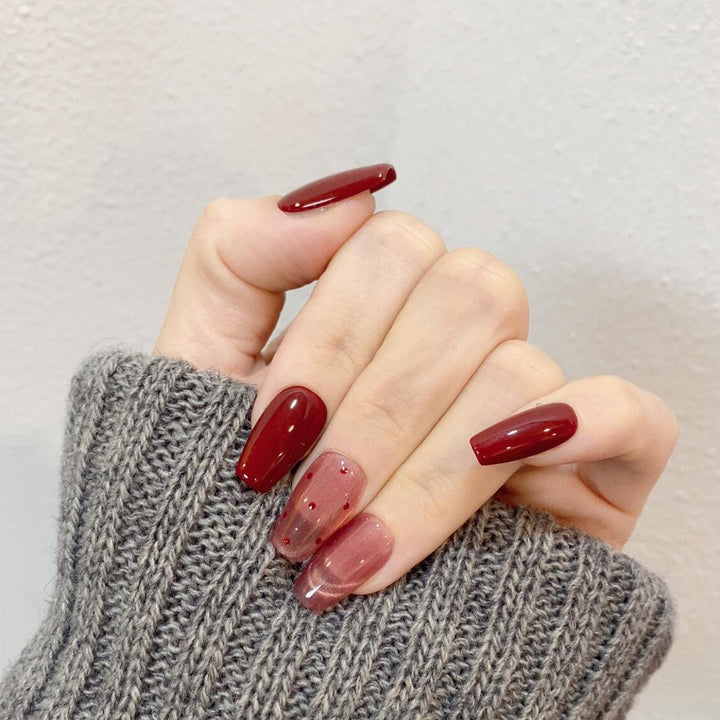 Artificial nail tips with creative dots and high gloss finish Stornfield