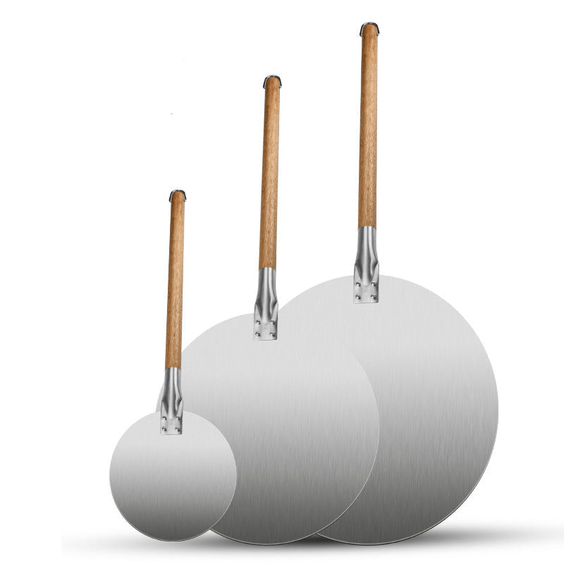 assorted sized round stainless steel pizza peels with long wooden handles Stornfield