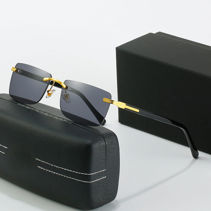 Women's fashionable sunglasses with a stylish, rectangular frame and elegant metal accents Stornfield