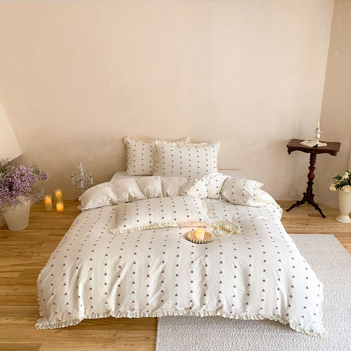 Cotton-linen bedding set with fine cherry embroidery and ruffled edge