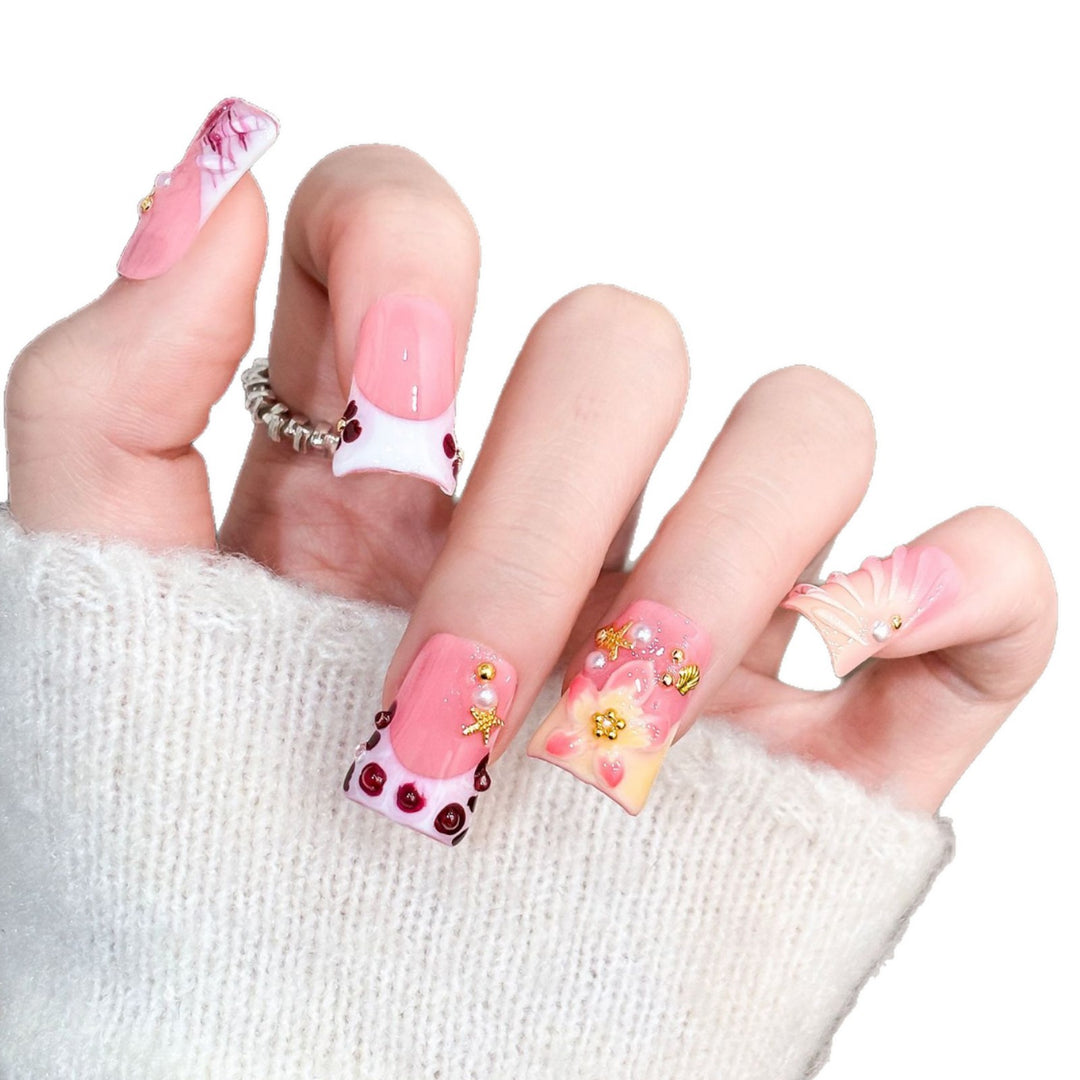 Artistic Acrylic Nail Design with Gem Accents