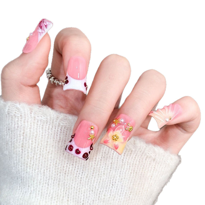 Artistic Acrylic Nail Design with Gem Accents