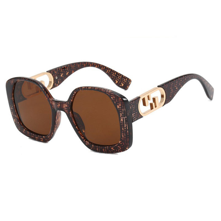 Women oversized sunglasses with extravagant geometric frame and elegant accents Stornfield
