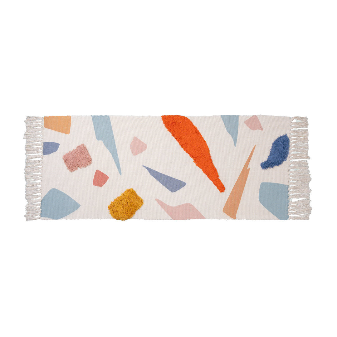 Woven runner with hand-tufted 3D applications and fringes