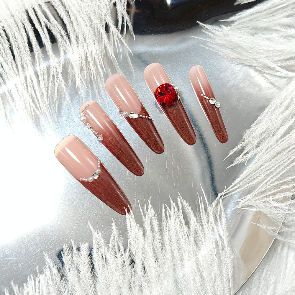 Artificial nails with glamorous rhinestone decorations Stornfield