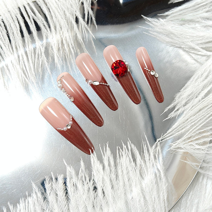 Artificial nails with glamorous rhinestone decorations Stornfield